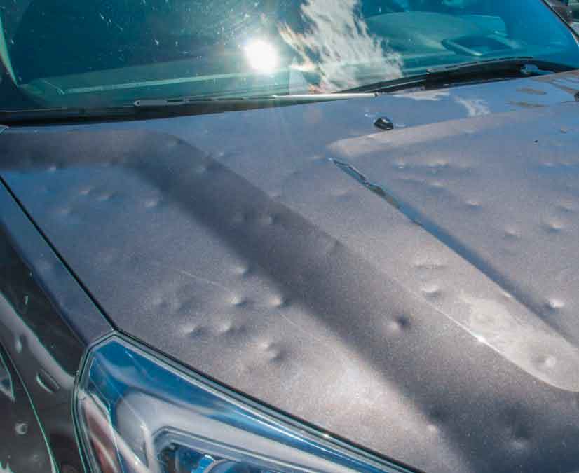 Golf Ball Sized Hail Damage on Car Hood