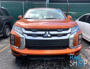 Orange SUV Hood Hail Damage