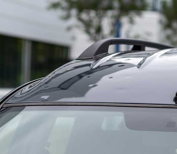 Severe auto hail damage on a vehicle evaluated for total loss insurance claims